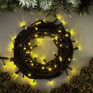 Новогодняя гирлянда-нить "Конус" 600 Led 25 м (черный провод, желтый+белый) 12k01p120 фото